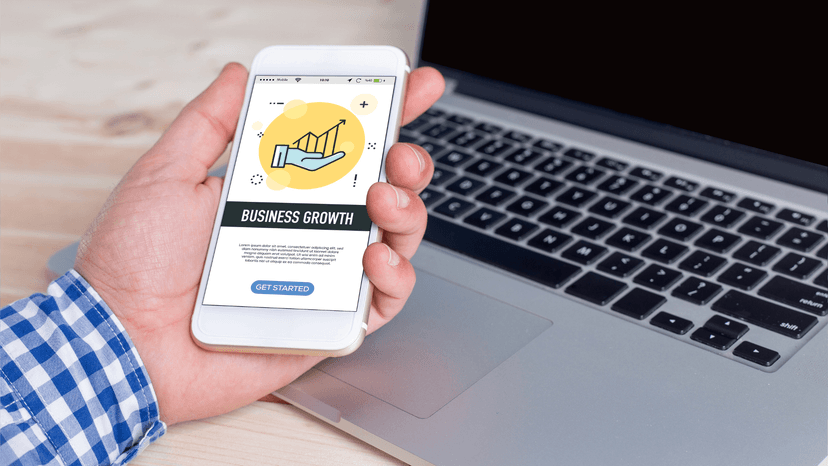 person using iphone to access business growth content