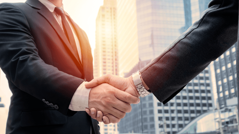 two business men shaking hands