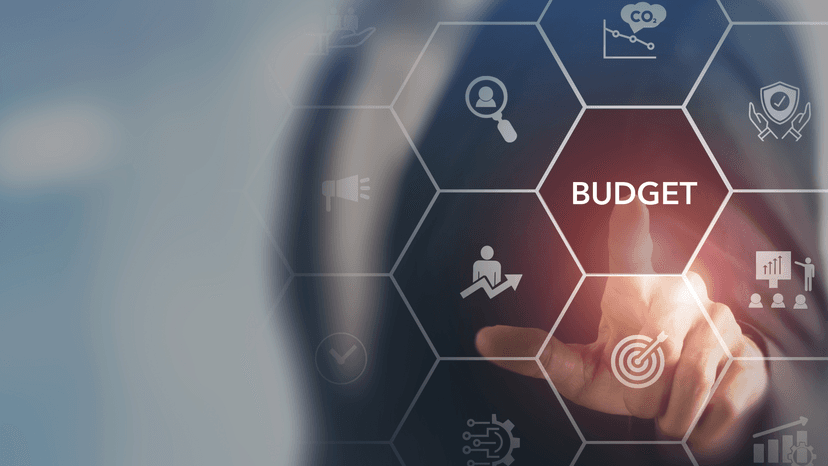 man pointing to a superimposed budget button